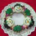 christmas wreath cookie decorated with snowman cookies
