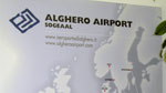 poster of flight maps in check in area of alghero airport