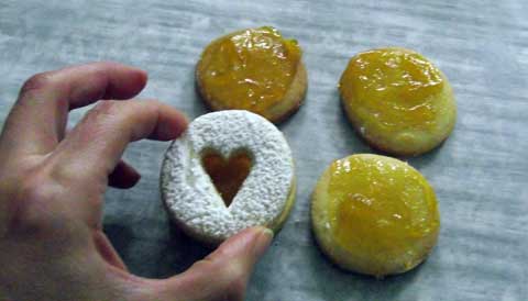 assembling the jam filled italian biscuits