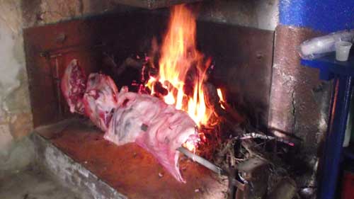  a nice spit full of meat roasting