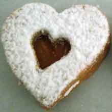 heart shaped alomd cookie with jam