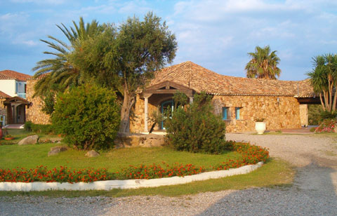 entrance at the corte bianca resort in cardedu