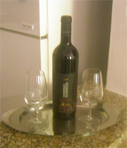 bottle of wine and glasses on a tray