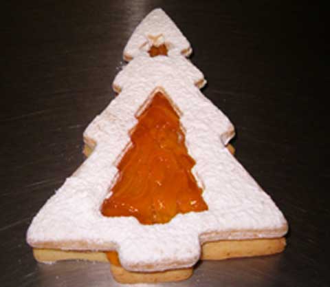 a jan sandwiched christmas tree cookie