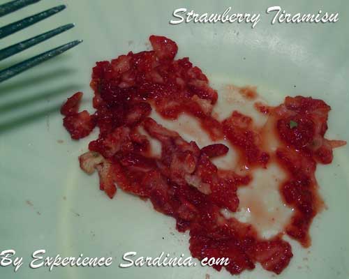 crushing strawberries for making tiramisu