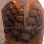 stack of wooden wine barrels