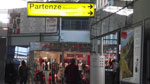 checkin area at cagliari airport with departures sign