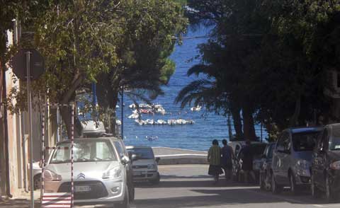 road that leads to the harbor in cala gonone