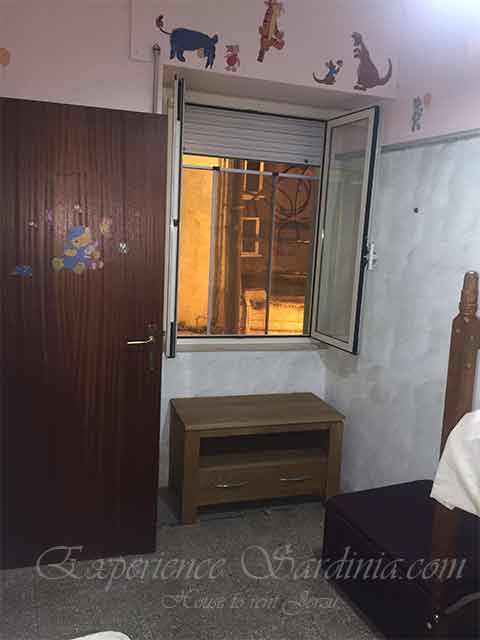 view from otherside of bedroom in a cheap house to rent in sardinia
