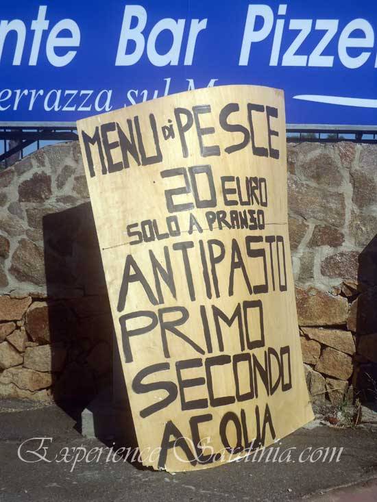 billboard showing prices of menu in cannigione sardinia