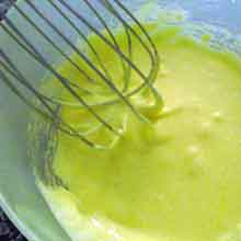 whisking eggs and sugar